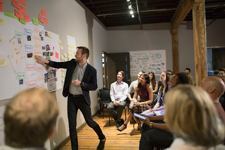 Team members participating in workplace group activity
